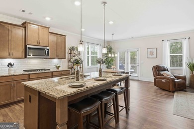 Located in the sought-after Georgian subdivision, this beautiful on The Frog Golf Club in Georgia - for sale on GolfHomes.com, golf home, golf lot