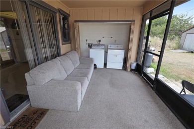 This income-producing duplex is located in San Carlos Park close on Estero Country Club in Florida - for sale on GolfHomes.com, golf home, golf lot