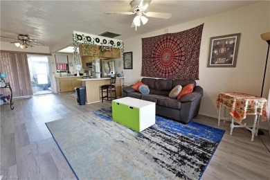 This income-producing duplex is located in San Carlos Park close on Estero Country Club in Florida - for sale on GolfHomes.com, golf home, golf lot