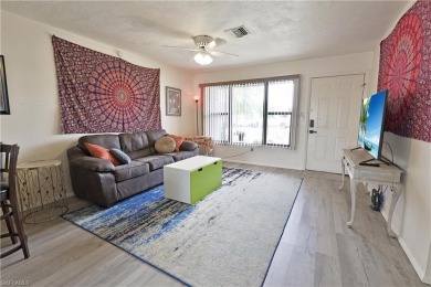 This income-producing duplex is located in San Carlos Park close on Estero Country Club in Florida - for sale on GolfHomes.com, golf home, golf lot