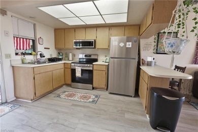This income-producing duplex is located in San Carlos Park close on Estero Country Club in Florida - for sale on GolfHomes.com, golf home, golf lot