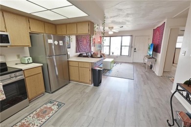 This income-producing duplex is located in San Carlos Park close on Estero Country Club in Florida - for sale on GolfHomes.com, golf home, golf lot