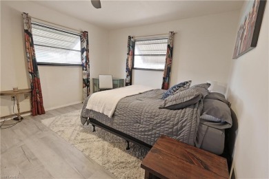This income-producing duplex is located in San Carlos Park close on Estero Country Club in Florida - for sale on GolfHomes.com, golf home, golf lot