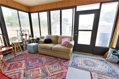 This income-producing duplex is located in San Carlos Park close on Estero Country Club in Florida - for sale on GolfHomes.com, golf home, golf lot