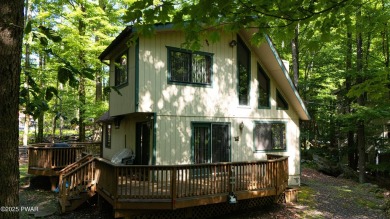 Welcome to this classic Pocono lake chalet, nestled in the heart on The Hideout Golf in Pennsylvania - for sale on GolfHomes.com, golf home, golf lot
