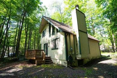 Welcome to this classic Pocono lake chalet, nestled in the heart on The Hideout Golf in Pennsylvania - for sale on GolfHomes.com, golf home, golf lot