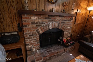Welcome to this classic Pocono lake chalet, nestled in the heart on The Hideout Golf in Pennsylvania - for sale on GolfHomes.com, golf home, golf lot