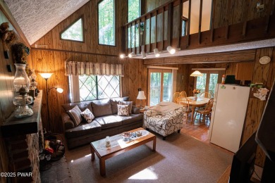 Welcome to this classic Pocono lake chalet, nestled in the heart on The Hideout Golf in Pennsylvania - for sale on GolfHomes.com, golf home, golf lot
