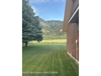 Stunning Home with Panoramic Views in Star Valley Ranch. If on Star Valley RV Golf Course in Wyoming - for sale on GolfHomes.com, golf home, golf lot