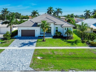 Marco Island is known for its surrounding Ten Thousand Islands on Island Country Club in Florida - for sale on GolfHomes.com, golf home, golf lot