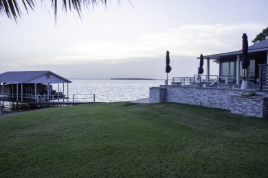 Exquisite Lakefront Home at Cedar Creek Country Club on Cedar Creek Country Club in Texas - for sale on GolfHomes.com, golf home, golf lot