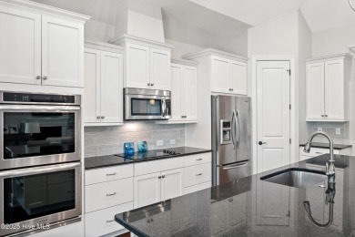 Exceptional Custom Hagood Home, located in the exclusive gated on Members Club At St. James Plantation in North Carolina - for sale on GolfHomes.com, golf home, golf lot