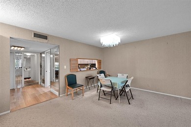 RARE CORNER KING MODEL IN PALM AIRE WITH GOLF VIEWS FROM EVERY on Palm-Aire Country Club and Resort - The Oaks in Florida - for sale on GolfHomes.com, golf home, golf lot