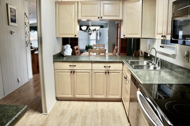 Clean, Furnished, and ready for a new owner. Just bring your on Spanish Lakes Fairways in Florida - for sale on GolfHomes.com, golf home, golf lot