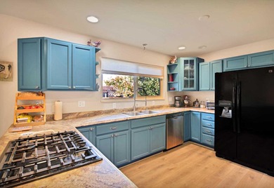 Welcome to your new home in the Redlands, just minutes from the on Tiara Rado Golf Course in Colorado - for sale on GolfHomes.com, golf home, golf lot