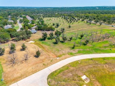 Howdy! Build your dream home on this pie-shaped lot just under on Pecan Plantation Country Club in Texas - for sale on GolfHomes.com, golf home, golf lot