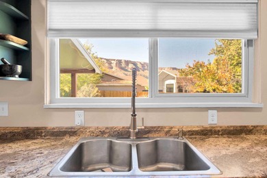 Welcome to your new home in the Redlands, just minutes from the on Tiara Rado Golf Course in Colorado - for sale on GolfHomes.com, golf home, golf lot