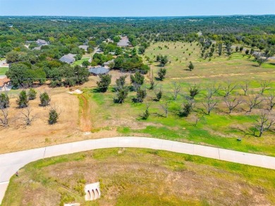 Howdy! Build your dream home on this pie-shaped lot just under on Pecan Plantation Country Club in Texas - for sale on GolfHomes.com, golf home, golf lot