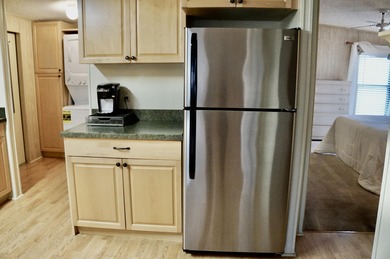 Clean, Furnished, and ready for a new owner. Just bring your on Spanish Lakes Fairways in Florida - for sale on GolfHomes.com, golf home, golf lot