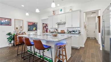 This is a SANDPIPER VILLA featuring large open concept kitchen on Mystic Dunes Resort and Golf Club in Florida - for sale on GolfHomes.com, golf home, golf lot