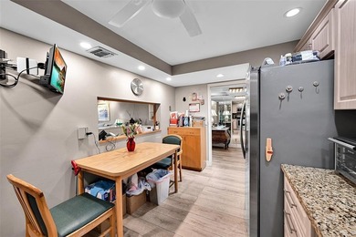 RARE CORNER KING MODEL IN PALM AIRE WITH GOLF VIEWS FROM EVERY on Palm-Aire Country Club and Resort - The Oaks in Florida - for sale on GolfHomes.com, golf home, golf lot