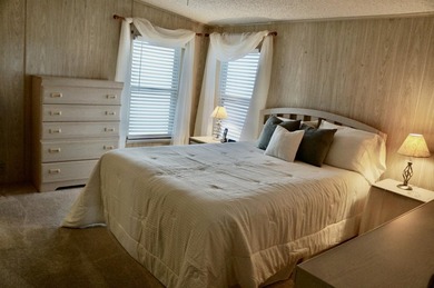 Clean, Furnished, and ready for a new owner. Just bring your on Spanish Lakes Fairways in Florida - for sale on GolfHomes.com, golf home, golf lot