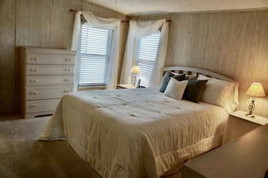 Clean, Furnished, and ready for a new owner. Just bring your on Spanish Lakes Fairways in Florida - for sale on GolfHomes.com, golf home, golf lot