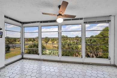 RARE CORNER KING MODEL IN PALM AIRE WITH GOLF VIEWS FROM EVERY on Palm-Aire Country Club and Resort - The Oaks in Florida - for sale on GolfHomes.com, golf home, golf lot