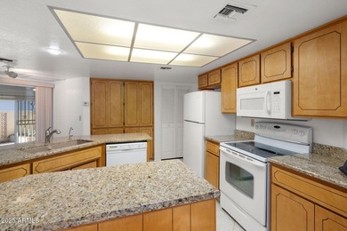 Discover the perfect blend of comfort, convenience, and on Apache Wells Country Club in Arizona - for sale on GolfHomes.com, golf home, golf lot