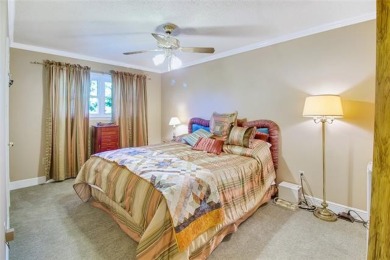 Indulge in comfort in this 4-bedroom, 2 bath, and two  1/2  bath on Timberlane Country Club in Louisiana - for sale on GolfHomes.com, golf home, golf lot