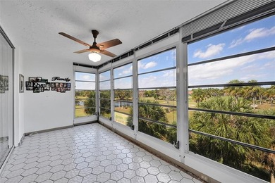 RARE CORNER KING MODEL IN PALM AIRE WITH GOLF VIEWS FROM EVERY on Palm-Aire Country Club and Resort - The Oaks in Florida - for sale on GolfHomes.com, golf home, golf lot