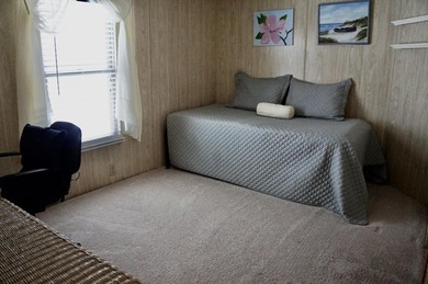 Clean, Furnished, and ready for a new owner. Just bring your on Spanish Lakes Fairways in Florida - for sale on GolfHomes.com, golf home, golf lot