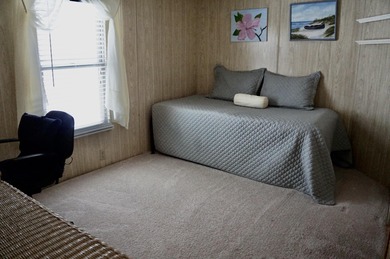 Clean, Furnished, and ready for a new owner. Just bring your on Spanish Lakes Fairways in Florida - for sale on GolfHomes.com, golf home, golf lot