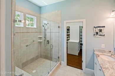 Exceptional Custom Hagood Home, located in the exclusive gated on Members Club At St. James Plantation in North Carolina - for sale on GolfHomes.com, golf home, golf lot