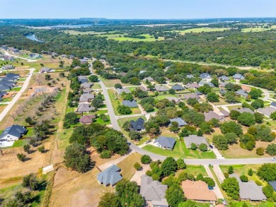 Howdy! Build your dream home on this pie-shaped lot just under on Pecan Plantation Country Club in Texas - for sale on GolfHomes.com, golf home, golf lot