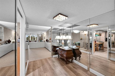 RARE CORNER KING MODEL IN PALM AIRE WITH GOLF VIEWS FROM EVERY on Palm-Aire Country Club and Resort - The Oaks in Florida - for sale on GolfHomes.com, golf home, golf lot