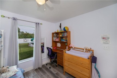 This fabulous home is situated on an oversized lot with a on Burnt Store Golf Club in Florida - for sale on GolfHomes.com, golf home, golf lot