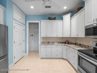 Located in Glen Lakes. Beautifully updated 2003 Addison Custom on Glen Lakes Country Club in Florida - for sale on GolfHomes.com, golf home, golf lot