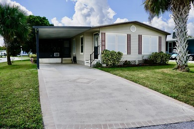 Clean, Furnished, and ready for a new owner. Just bring your on Spanish Lakes Fairways in Florida - for sale on GolfHomes.com, golf home, golf lot
