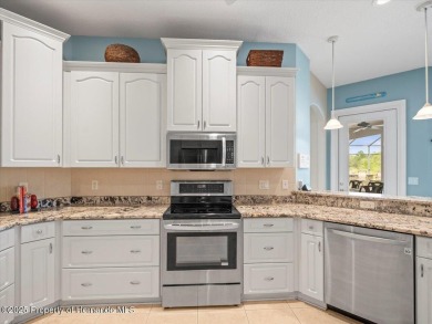Located in Glen Lakes. Beautifully updated 2003 Addison Custom on Glen Lakes Country Club in Florida - for sale on GolfHomes.com, golf home, golf lot
