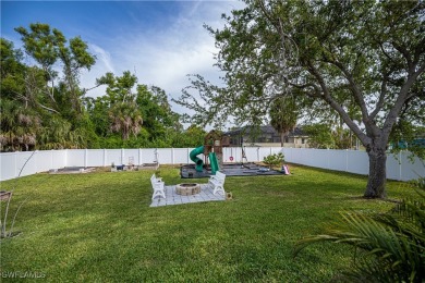 This fabulous home is situated on an oversized lot with a on Burnt Store Golf Club in Florida - for sale on GolfHomes.com, golf home, golf lot