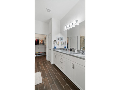 This is a SANDPIPER VILLA featuring large open concept kitchen on Mystic Dunes Resort and Golf Club in Florida - for sale on GolfHomes.com, golf home, golf lot