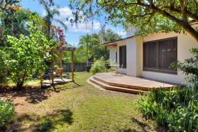 PRICE REDUCED!! ATTENTION: This Lake Hollingsworth mid-century on Cleveland Heights Golf Course in Florida - for sale on GolfHomes.com, golf home, golf lot