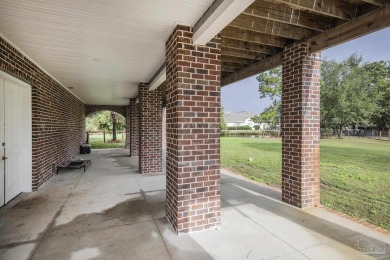 Welcome to your dream home nestled within Tiger Point! This on Tiger Point Golf and Country Club in Florida - for sale on GolfHomes.com, golf home, golf lot