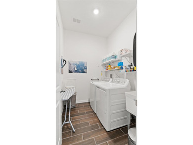 This is a SANDPIPER VILLA featuring large open concept kitchen on Mystic Dunes Resort and Golf Club in Florida - for sale on GolfHomes.com, golf home, golf lot