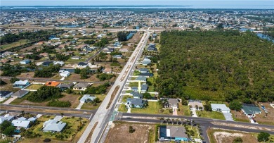 This fabulous home is situated on an oversized lot with a on Burnt Store Golf Club in Florida - for sale on GolfHomes.com, golf home, golf lot
