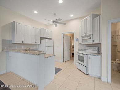 Located in Glen Lakes. Beautifully updated 2003 Addison Custom on Glen Lakes Country Club in Florida - for sale on GolfHomes.com, golf home, golf lot