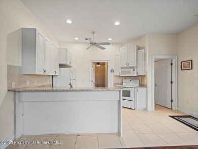 Located in Glen Lakes. Beautifully updated 2003 Addison Custom on Glen Lakes Country Club in Florida - for sale on GolfHomes.com, golf home, golf lot