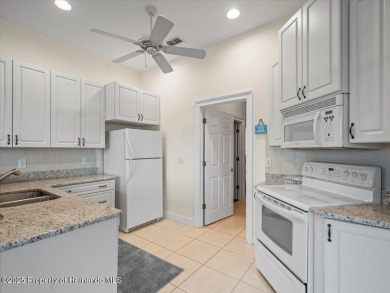 Located in Glen Lakes. Beautifully updated 2003 Addison Custom on Glen Lakes Country Club in Florida - for sale on GolfHomes.com, golf home, golf lot