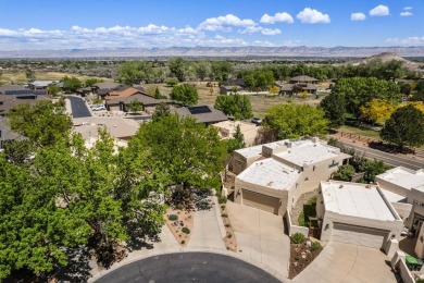 Welcome to your dream home in the coveted Seasons neighborhood on Tiara Rado Golf Course in Colorado - for sale on GolfHomes.com, golf home, golf lot